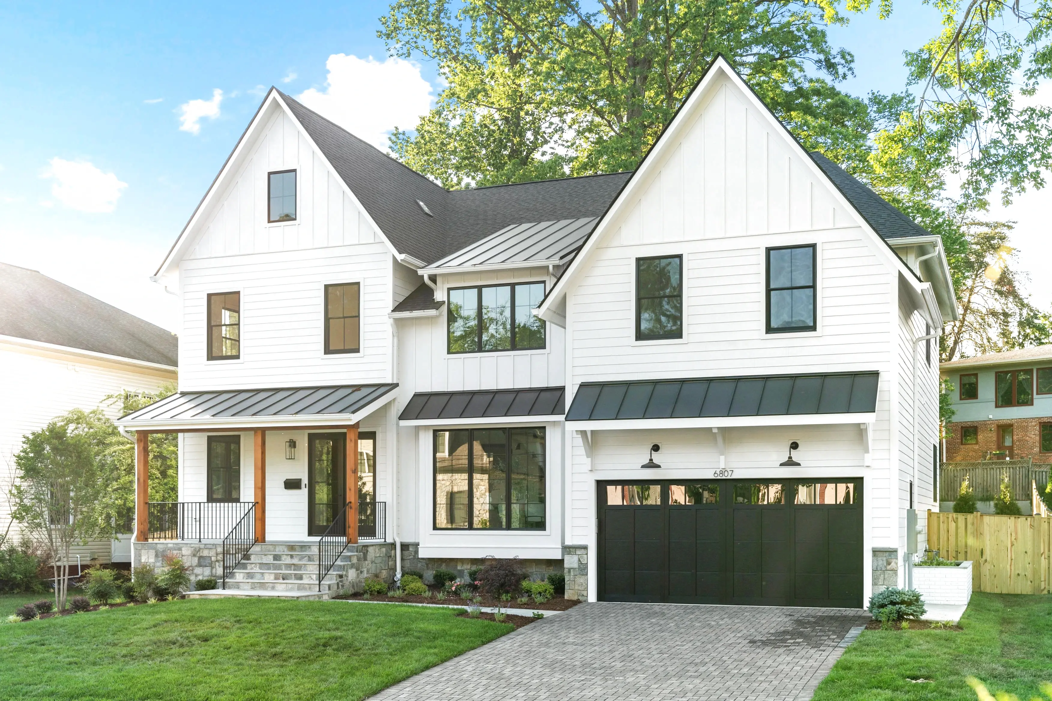 Professional real estate exterior photography of a modern luxury home with manicured landscaping in the Washington DC metro area by Umedia