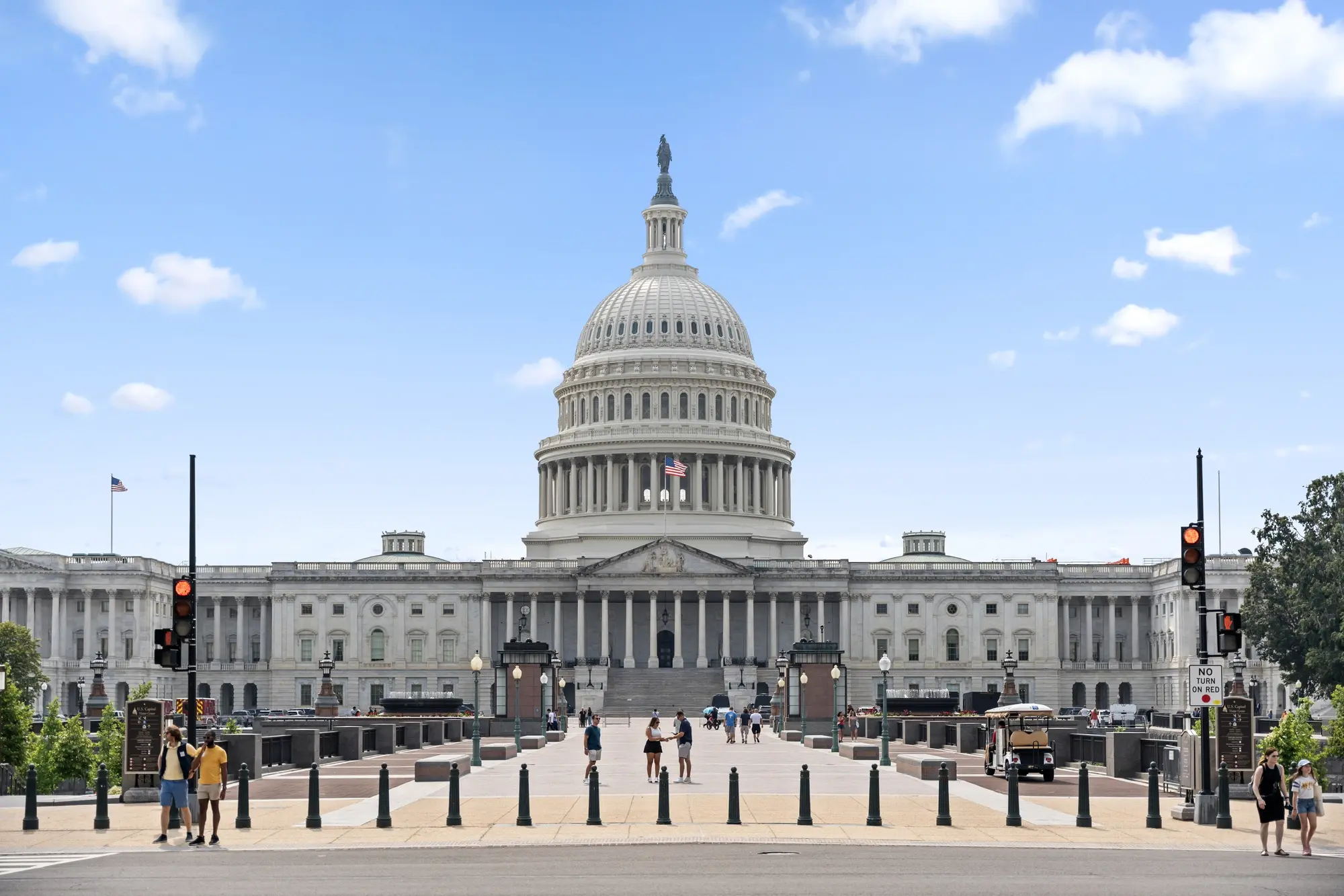 Washington DC real estate photography – exterior shot of the U.S. Capitol building under blue sky Washington DC real estate photography – exterior shot of the U.S. Capitol building under blue sky
