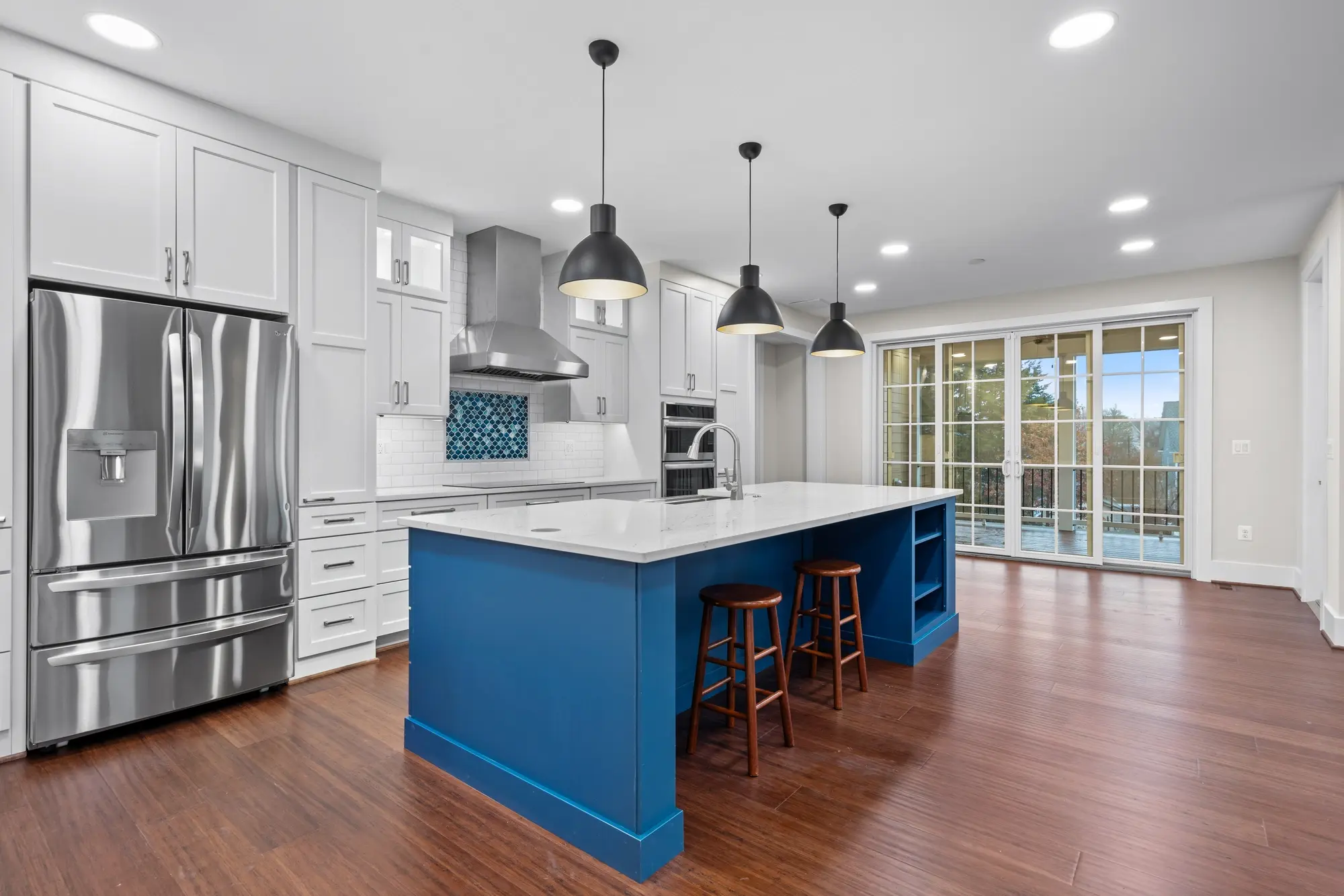 Gourmet kitchen with blue island and pendant lights, Falls Church VA