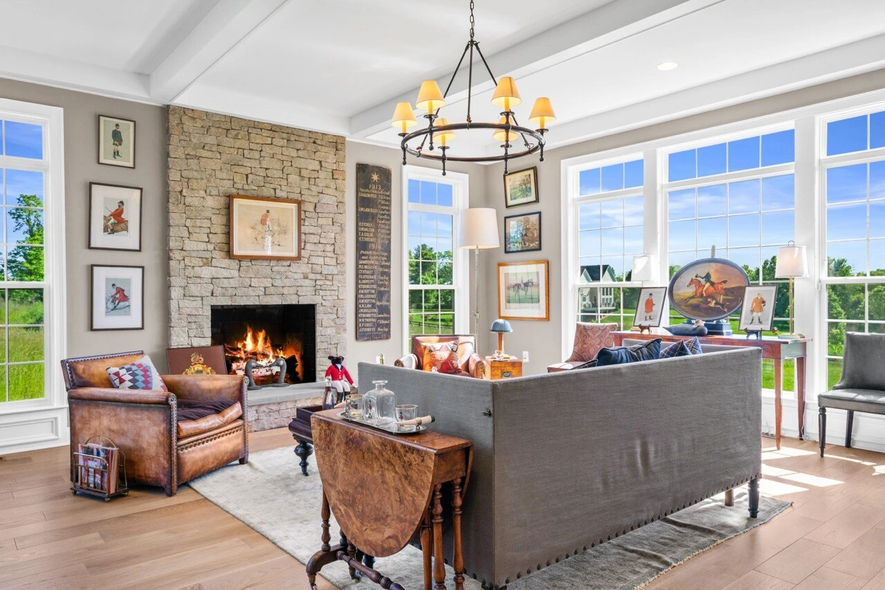 Estate living room with stone fireplace — McLean real estate photography