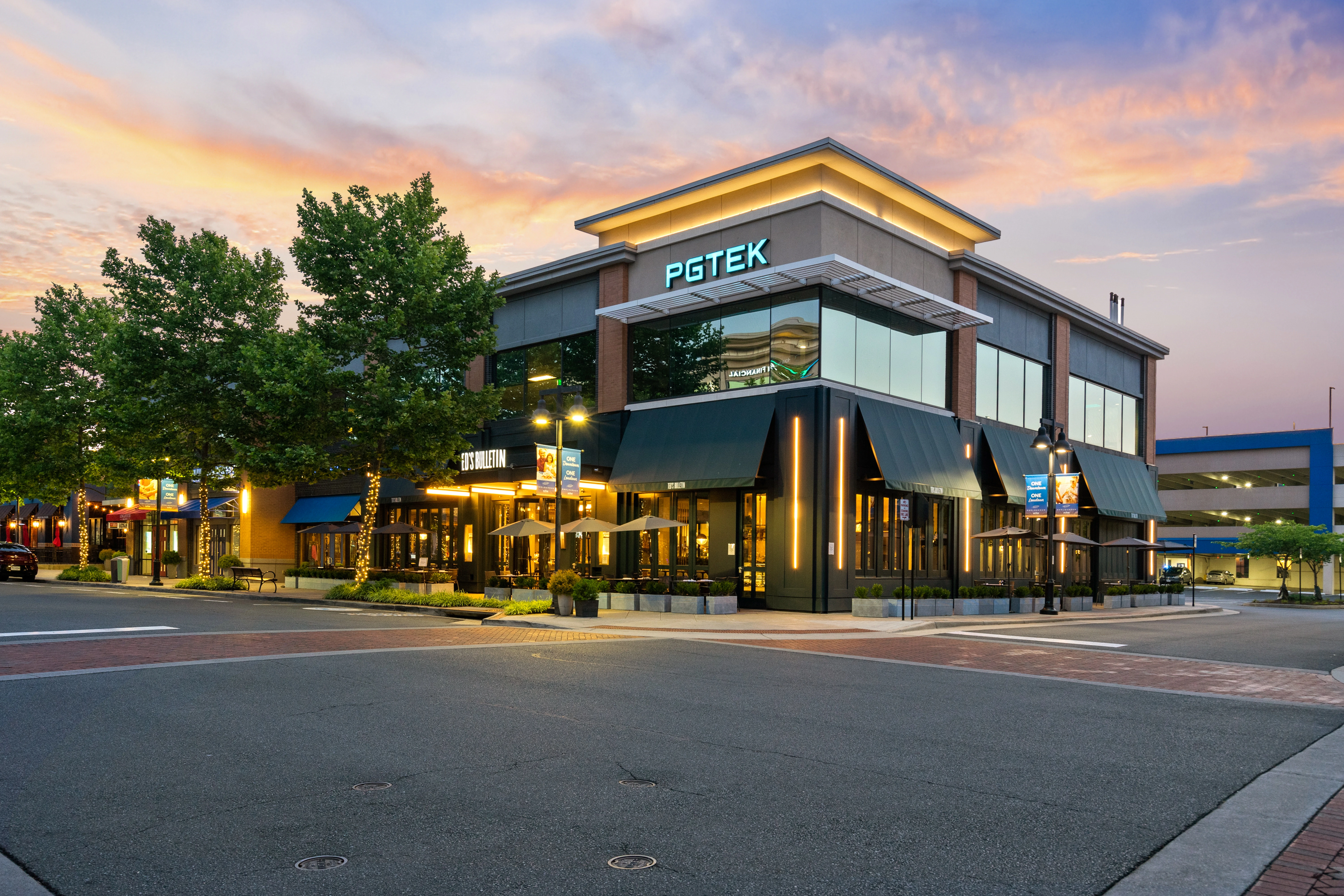 Open floor plan dining and kitchen area with pendant lighting