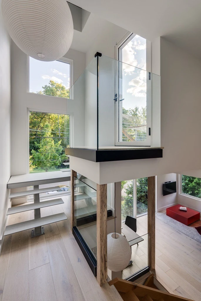 Eco house vertical exterior — modern design in wooded forest setting